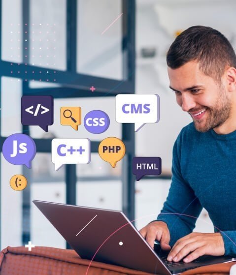 Young man working on a laptop with coding and web development icons around him.